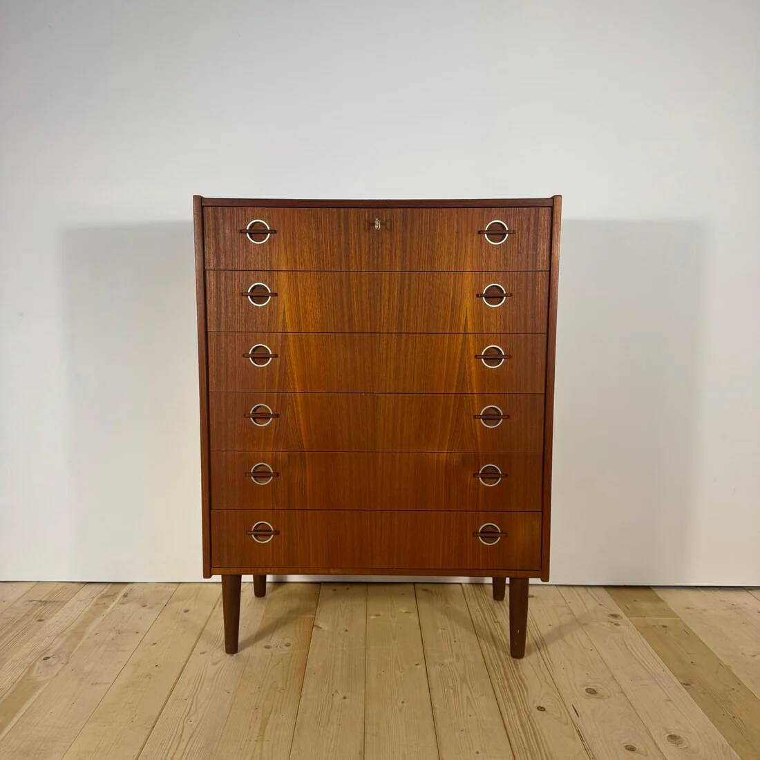 Danish 1960s teak chest of drawers with metal insert