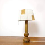 Wooden candle holder mounted as a lamp and its rope shade, 47.5cm.