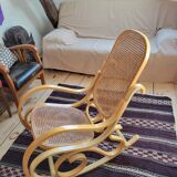 Rocking chair in arched wood and cane