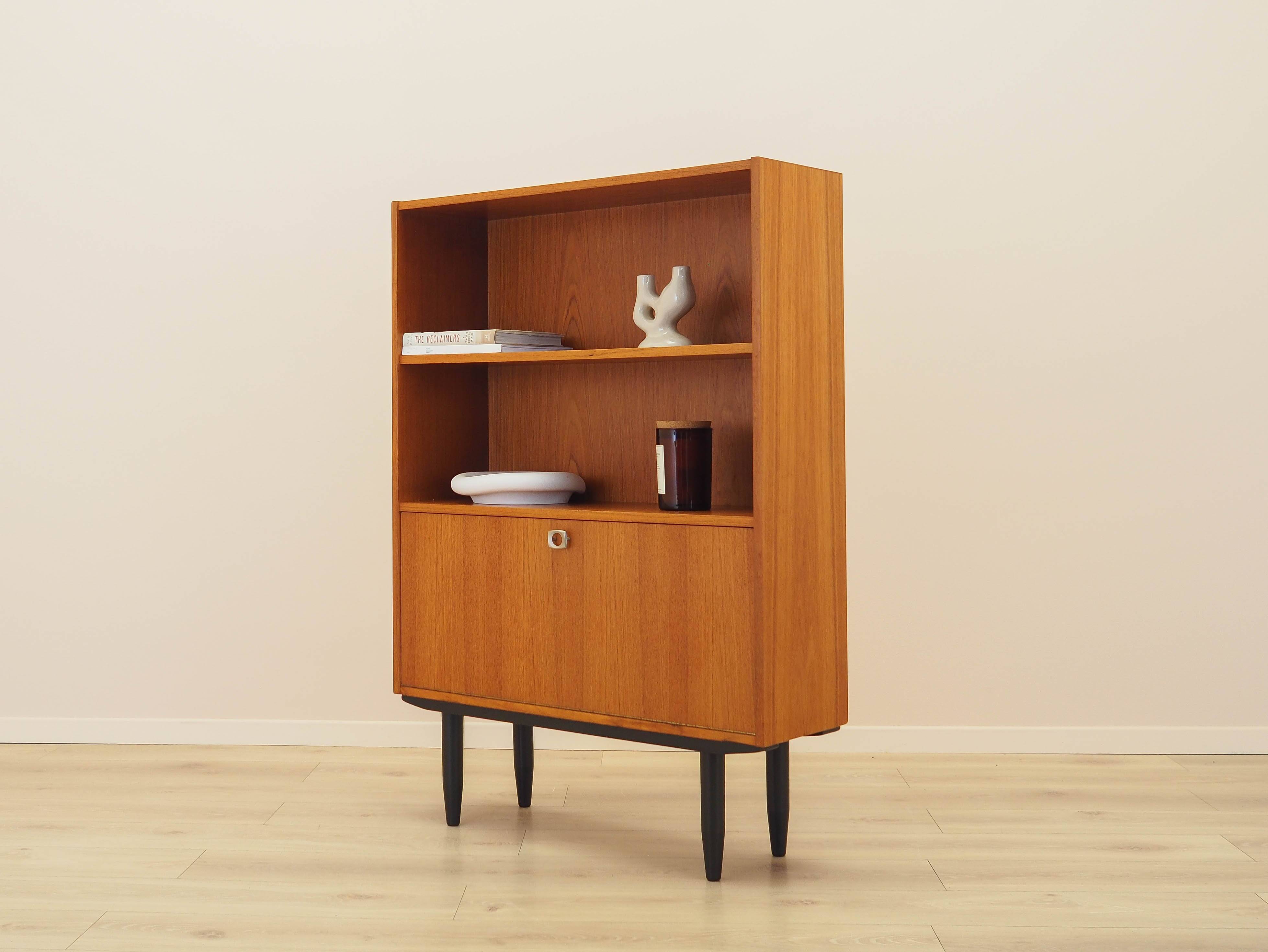 Danish teak-veneered bookcase with a bar and adjustable shelves, 1970s.