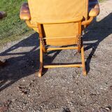 Paire de fauteuils cuir de style chesterfield