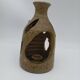 Stoneware candle holder.