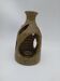 Stoneware candle holder.