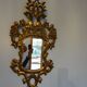 Miroir XIXème en bois sculpté doré 46 x 93 cm