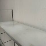 Metal string shelf