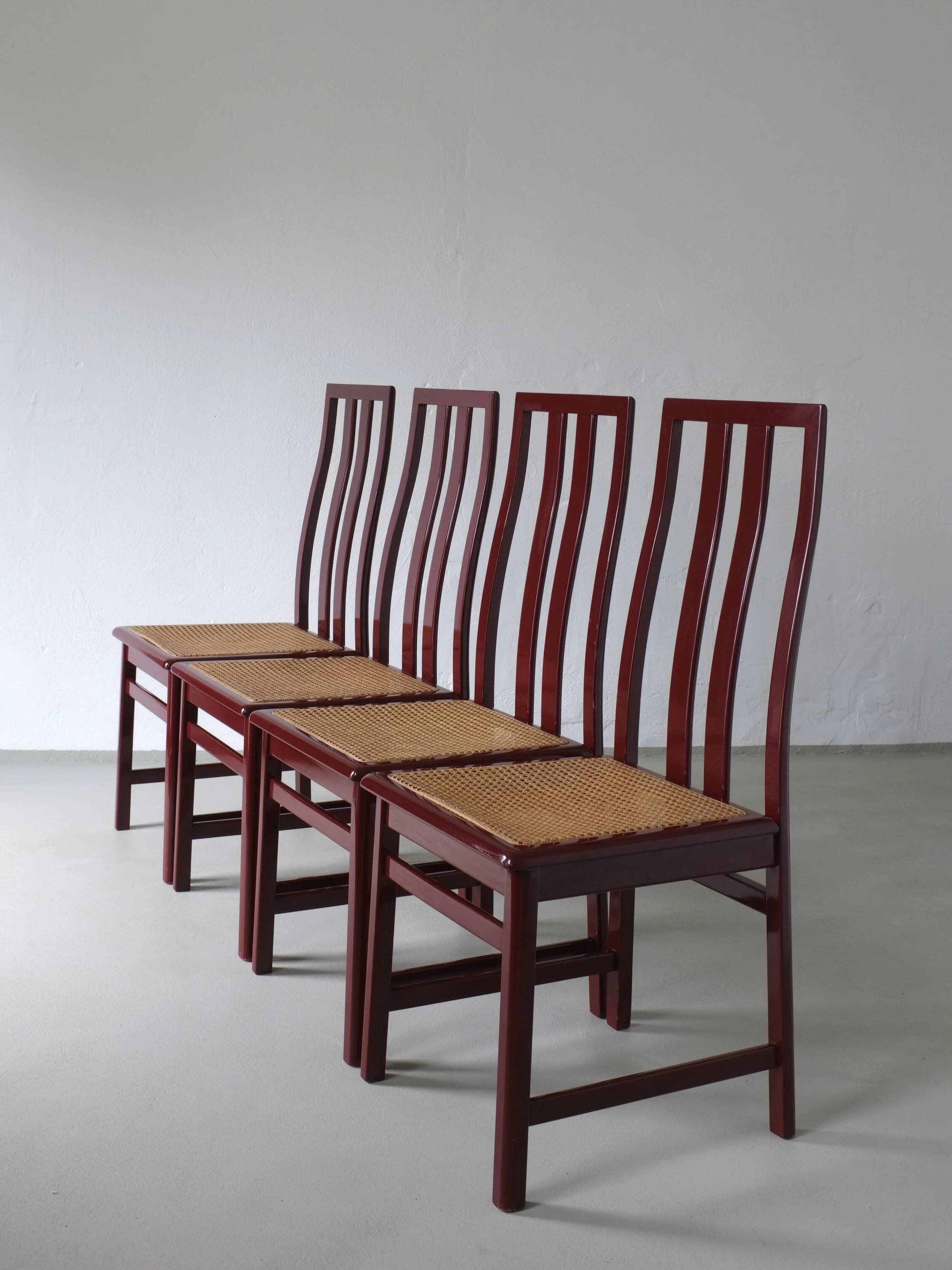 4 Glossy wine red cane seat chairs | Italy | 1970s