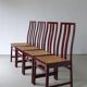 4 Glossy wine red cane seat chairs | Italy | 1970s
