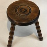 Dark turned wood tripod stool