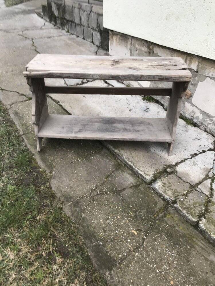 Small country bench in grey pine, rustic antique style with storage shelf.