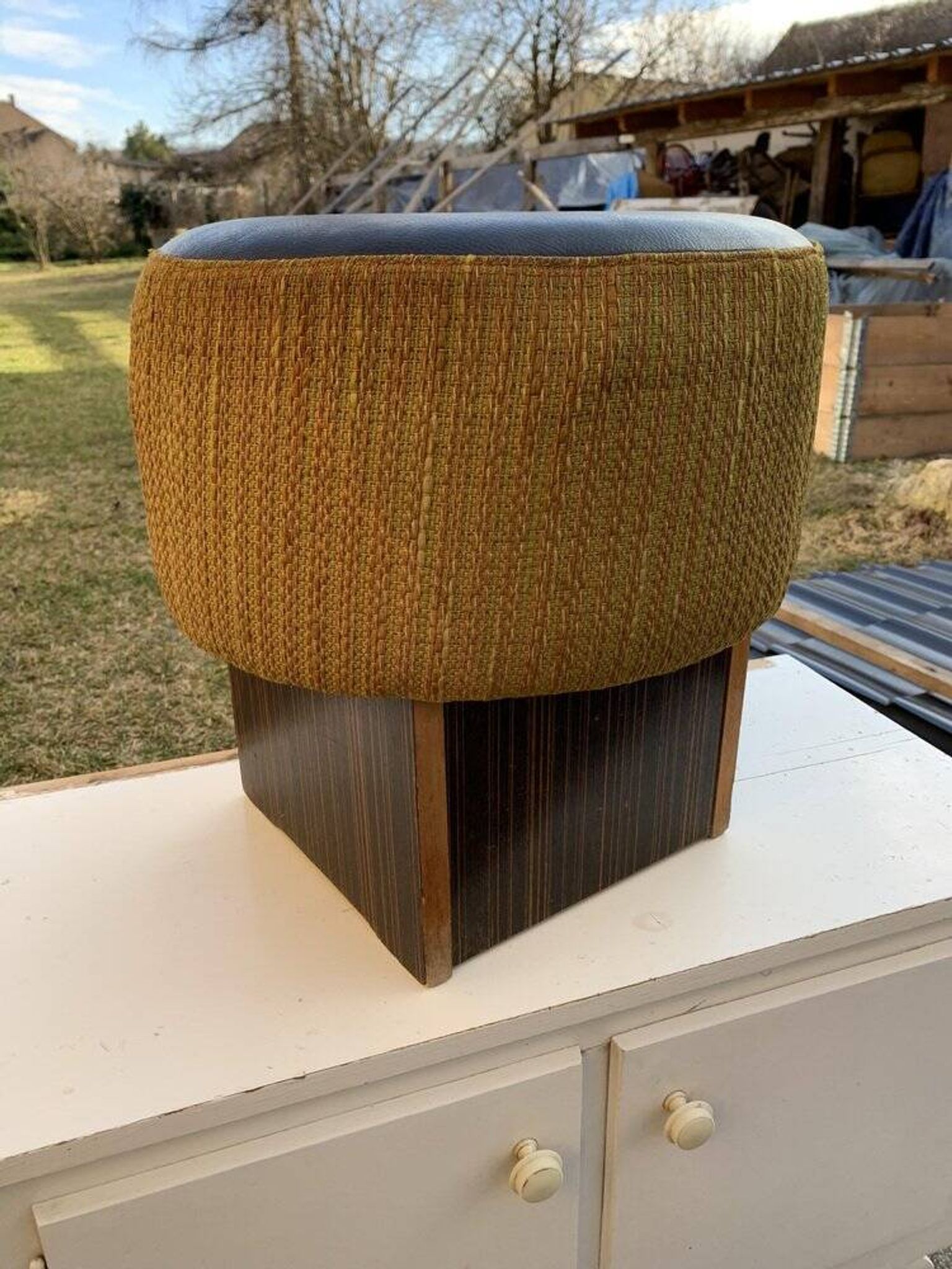 Black hexagonal pouf in fabric and faux leather, mid-century Hungarian ottoman from the 1950s.