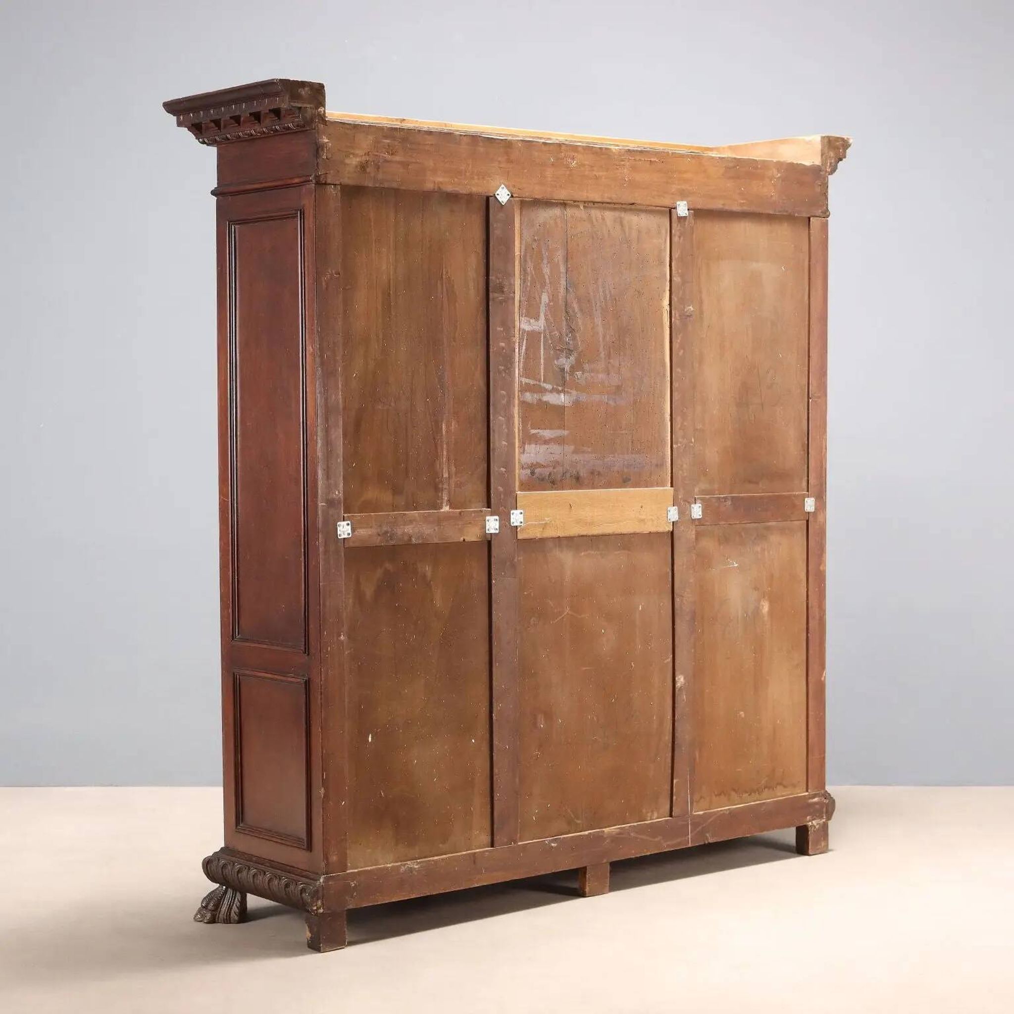Old library in neo-Renaissance style made of walnut, 20th century.