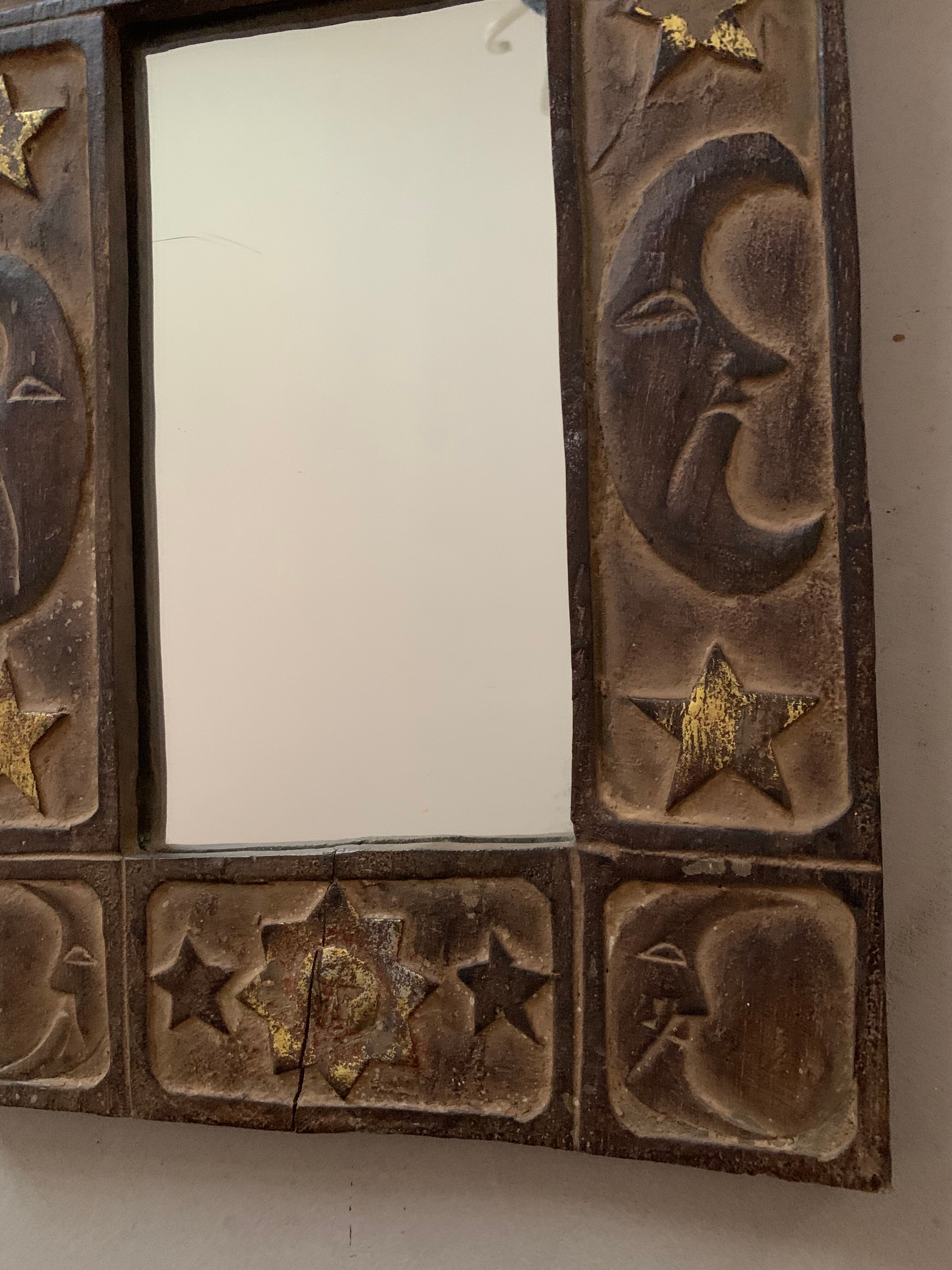 Antique carved wooden mirror