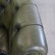 Chesterfield office chair in green cowhide leather on casters with high back