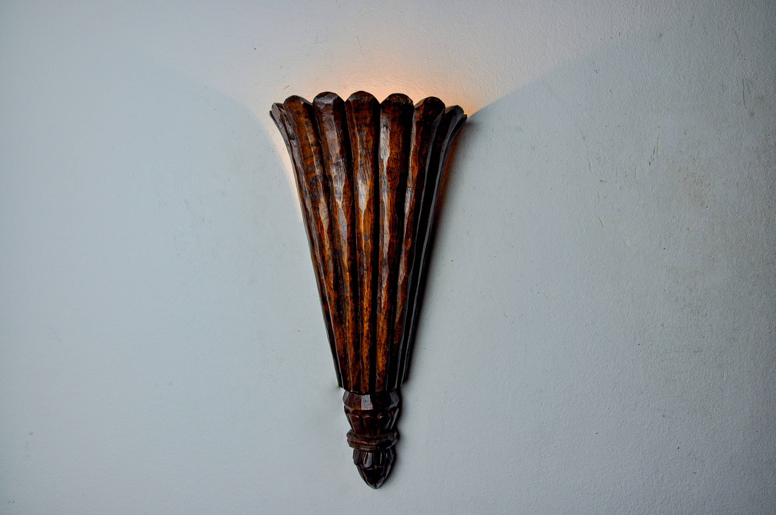 Art Deco wall light in carved wood, France, 1930
