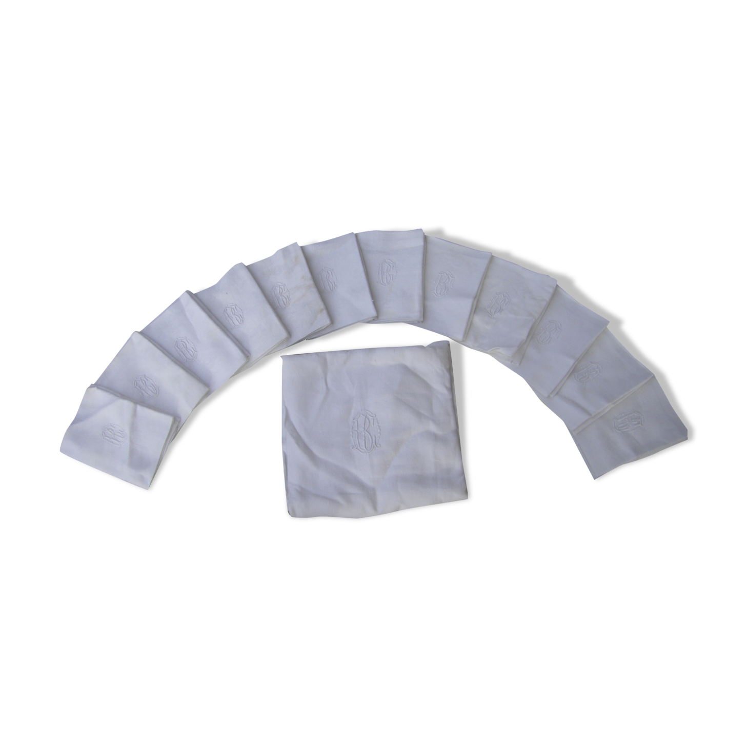 Tablecloth and its twelve monogrammed towels.