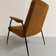 Vintage metal armchair with orange boucle fabric, French design from the 1950s.