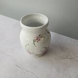 Vintage white porcelain vase by Revol with pink flowers.