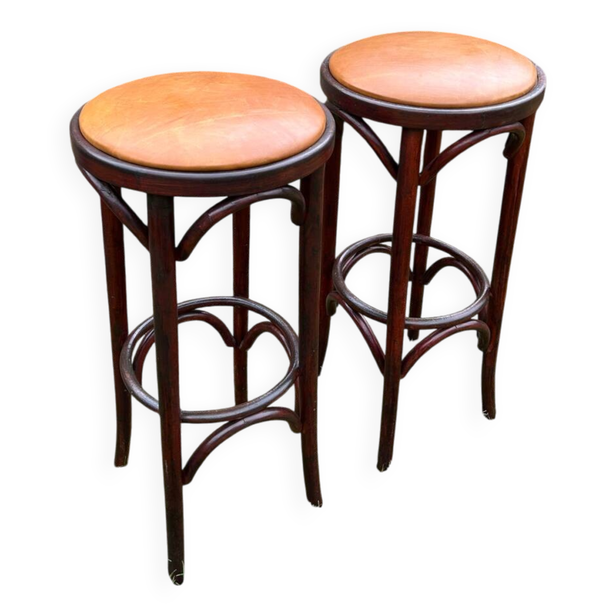 Pair of curved wooden bistro stools with leather seats