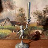 Old cherub candle holder