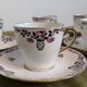 18-piece porcelain coffee set signed "Aux Lions de Faïence Paris"