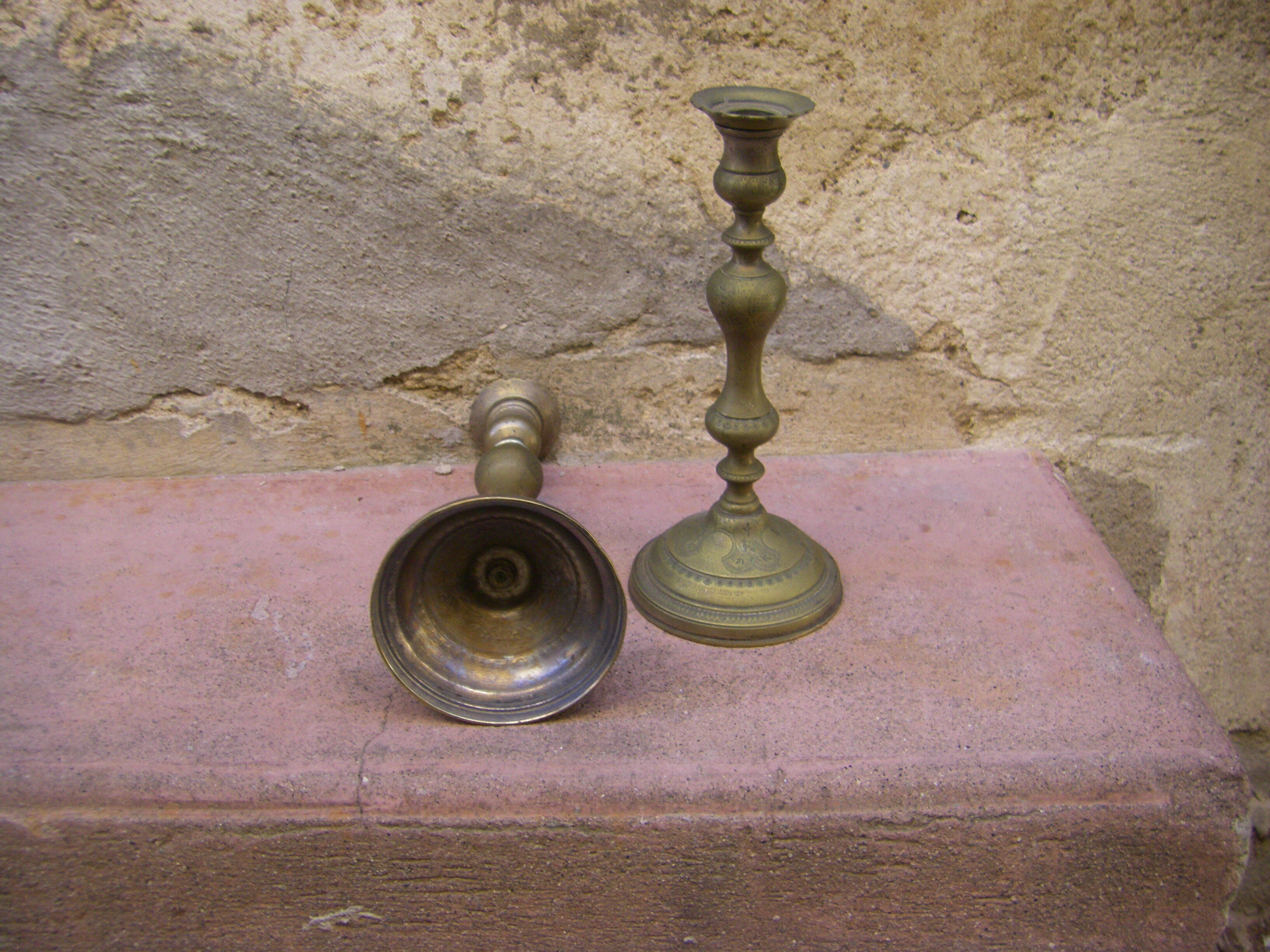 Pair of candle holders with oriental decoration