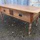 Solid cherry game table with 2 front drawers and panelled crosspieces.