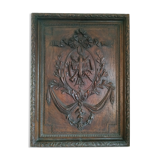 Carved wooden panel décor with music trophy
