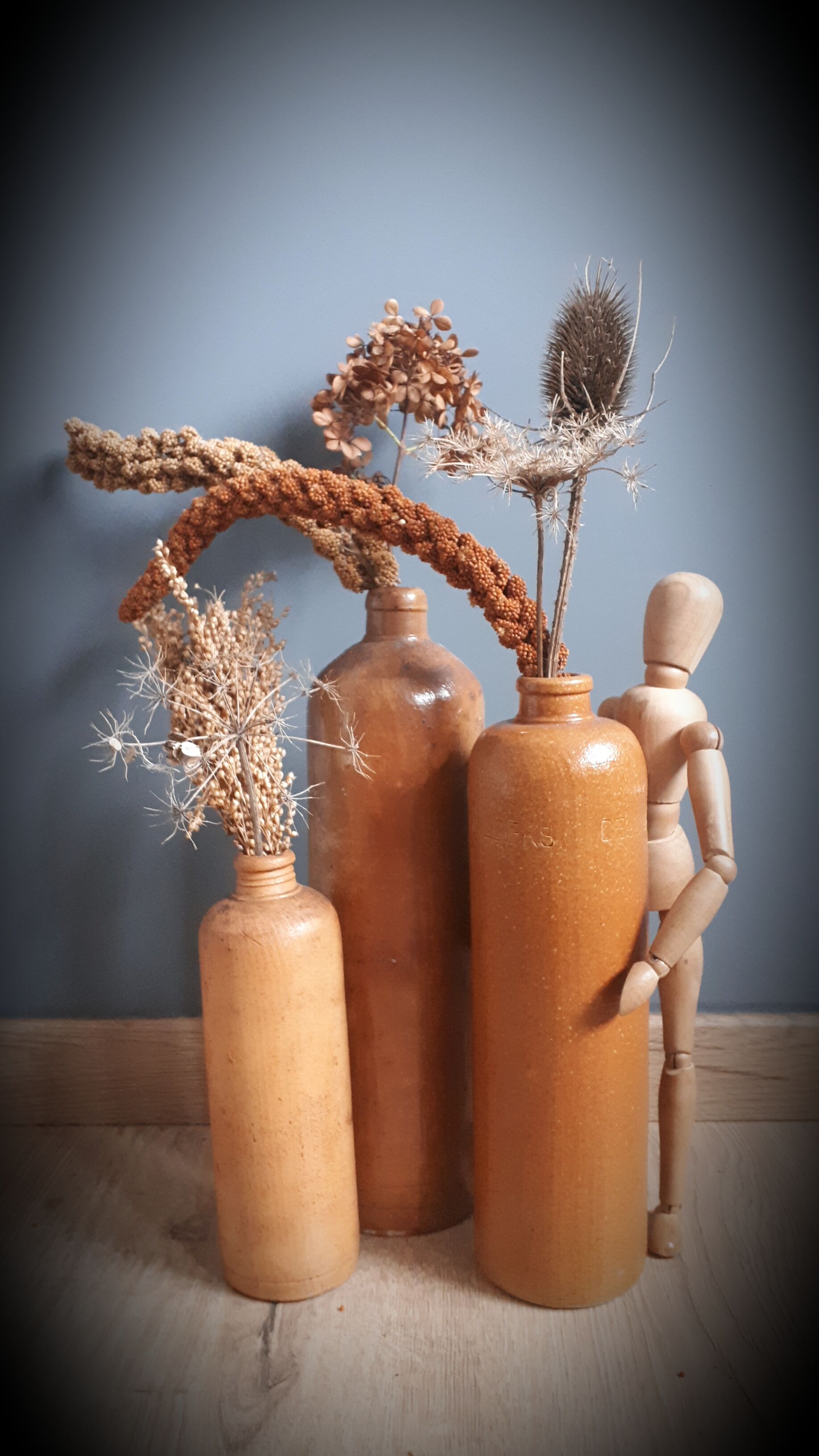 Trio of sandstone bottles 3