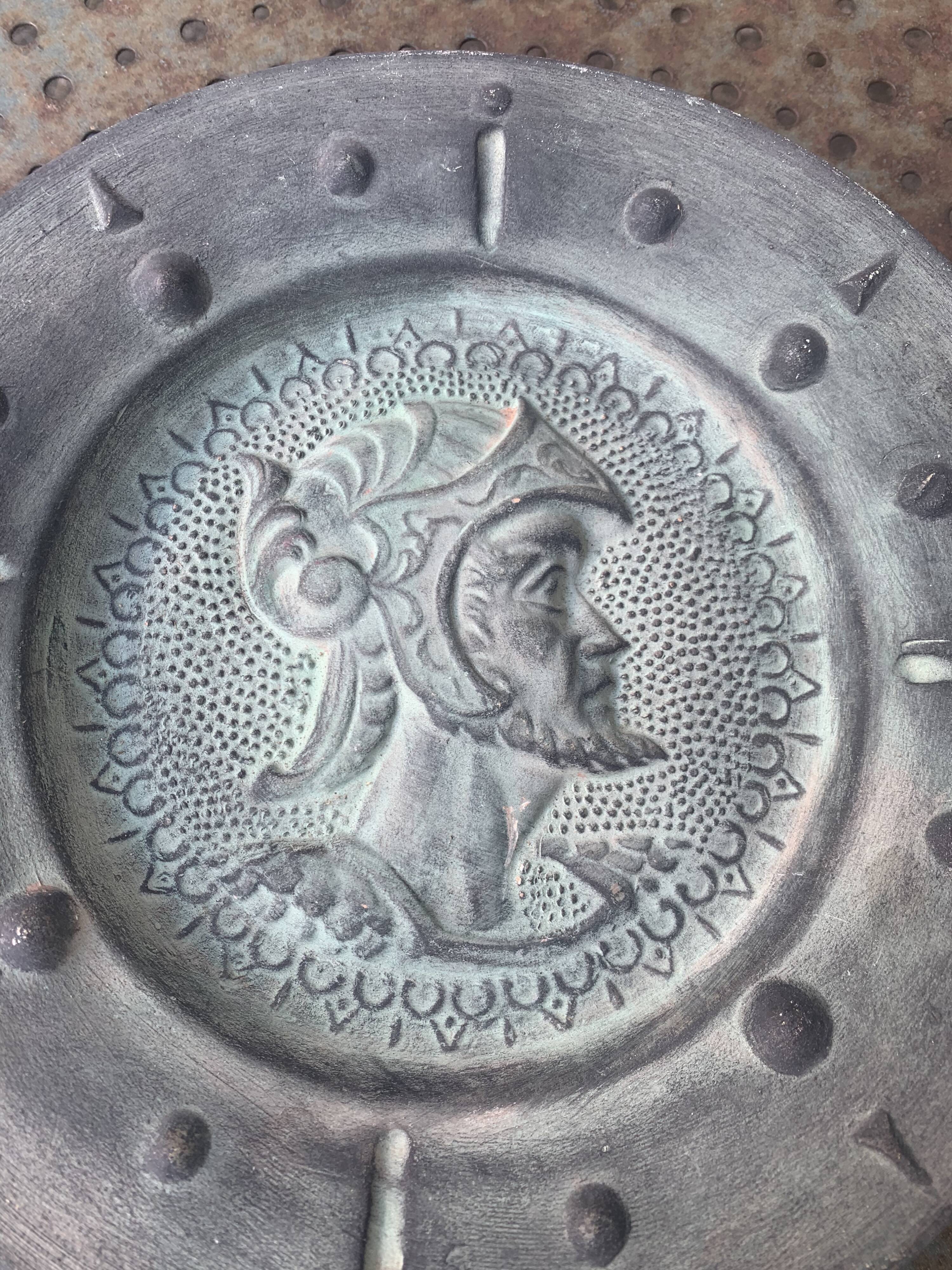 Decorative plate of a Greco-Roman soldier, terracotta, vintage