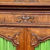 Liège bookcase in carved oak Regency style