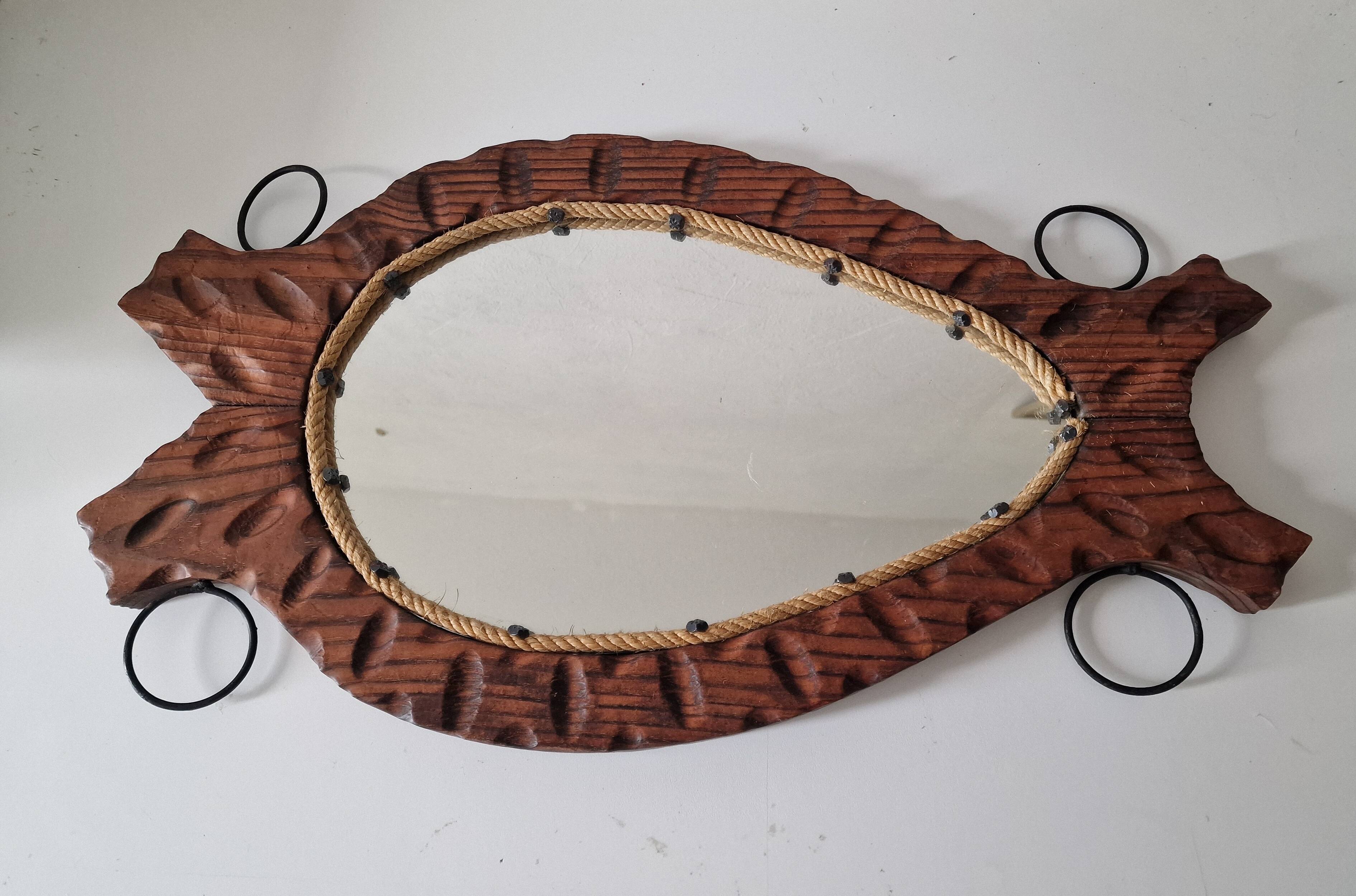 Brutalist mirror in wood and rope, free form.