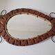 Brutalist mirror in wood and rope, free form.
