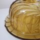 Bell and smoked yellow glass dish