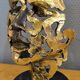 According to Salvador Dalí – The Test of Time – Bronze with gold leaf