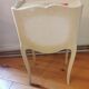 Pair of bedside tables louis XV style XX th century, painted floral decoration