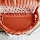 Terracotta rattan and wicker shelf