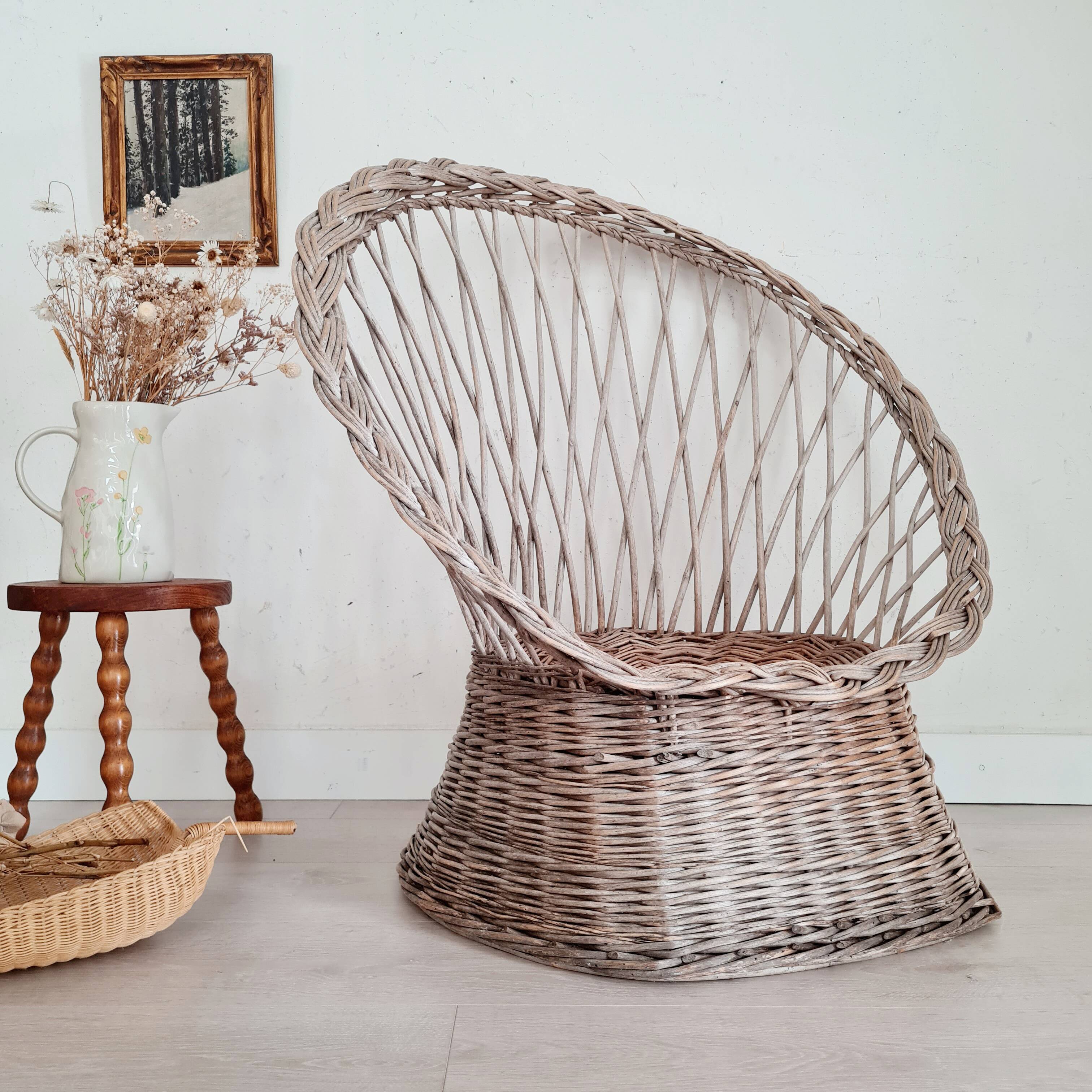 Antique armchair in gray woven wicker