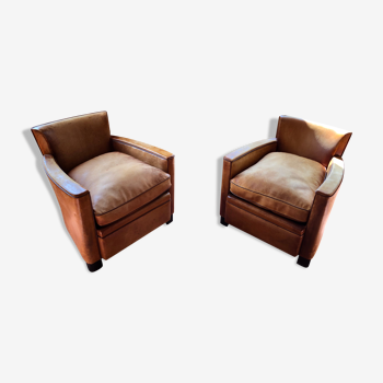 Pair of club armchairs in havana leather