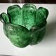 Green glass paste emptying cup from the Art Deco period