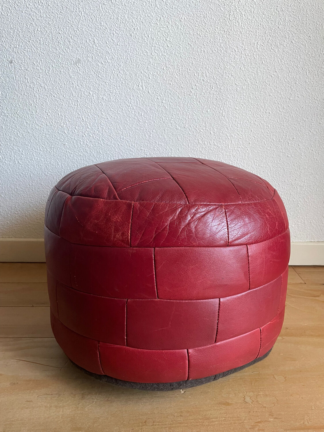 Red patchwork leather pouf