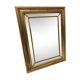 Mirror in gold and silver color