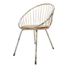 Fauteuil corbeille en métal et bois.