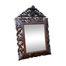 Beveled mirror in chiseled wood late nineteenth century.