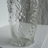 Glass vase with stylized flower pattern