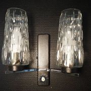 Pair of wall lights from the 1950s-1960s with a push button switch.
