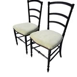 Pair of Napoleon III chairs in black stained wood