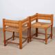 Pair of turned wooden corner chairs with rush seats, 1940.
