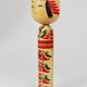 Decorative Kokeshi doll sculpture from northern Japan, hand-painted, signed.