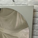 Round mirror on laminated support