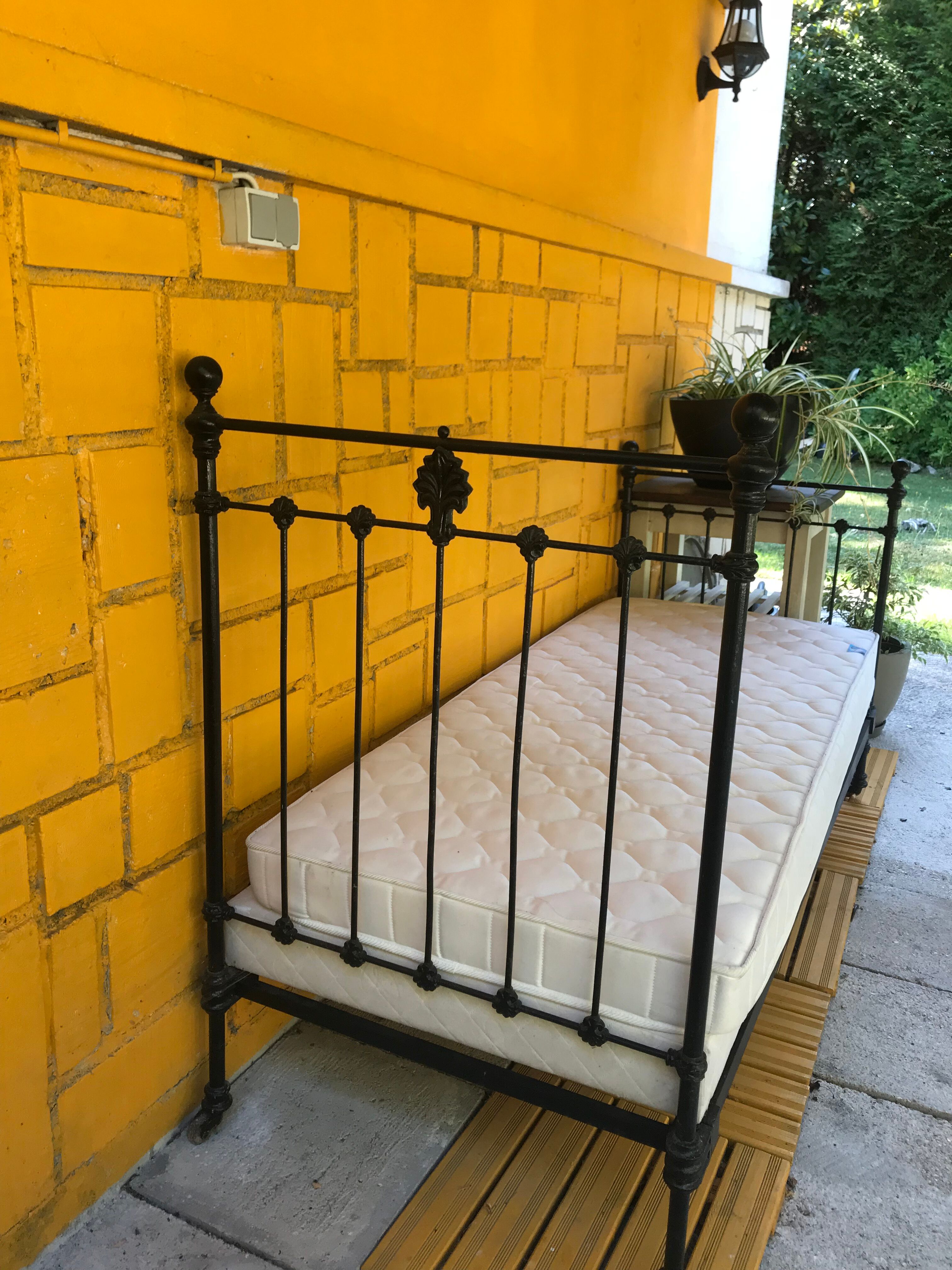 Ancient wrought iron bed